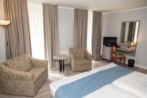 TV a/nebo společenská místnost v ubytování Hotel Willmeroth Windeck