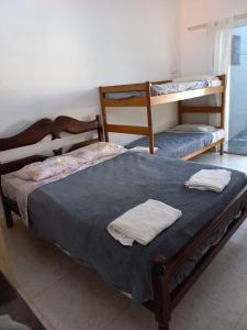 Ένα ή περισσότερα κρεβάτια σε δωμάτιο στο Renascer Suites