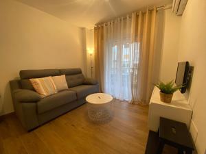 A seating area at Arenales Sol y Playa Galatea I
