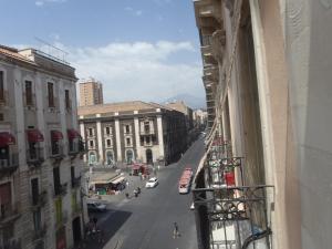 a view of a city street from a building at Gianluca's Room in Catania