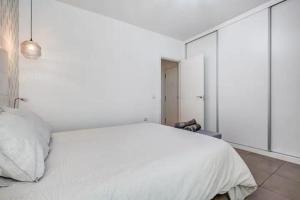 Łóżko lub łóżka w pokoju w obiekcie Casa el Majorero