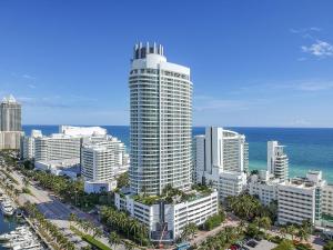 an aerial view of a city with a tall building at Junior Suite 2 at Sorrento Residences- Miami Beach home in Miami Beach