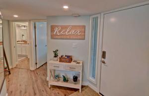 a hallway with a welcome sign on the wall at Gulfpoint 3209 in South Padre Island
