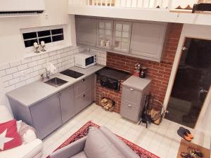 a kitchen with a dog in the middle of it at 4 person holiday home in TORSH LLA in Torshälla