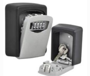 a black and white image of a safe with a key at Lemas 901 in Ajman 