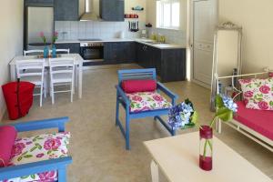 A kitchen or kitchenette at Villa in Nopigia with private pool