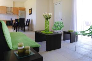A seating area at Villa in Nopigia with private pool