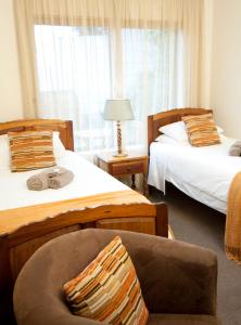 Postel nebo postele na pokoji v ubytování Overmeer Guest House