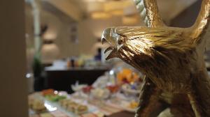 a table full of food with a bird carved out at Stadt-gut-Hotel Gasthof Goldener Adler in Schwäbisch Hall