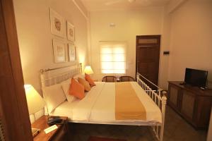 Postel nebo postele na pokoji v ubytování Bandarawela Hotel