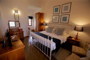 Postel nebo postele na pokoji v ubytování Bandarawela Hotel
