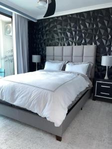 JF Three Bedroom Apartment客房内的一张或多张床位