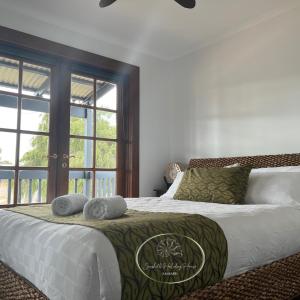Кровать или кровати в номере Seashells Holiday House - Kalbarri