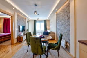 TV a/nebo společenská místnost v ubytování Apartman 65 Zlatibor