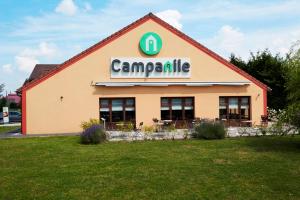 a building with a sign on the side of it at Campanile Lille - Lomme in Lomme