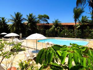 Búzios Internacional Apart Hotel tesisinde veya buraya yakın yüzme havuzu