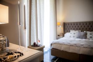 A bed or beds in a room at Hotel Mediterraneo