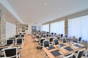 Predel za sedenje v nastanitvi Hotel Luna Garni