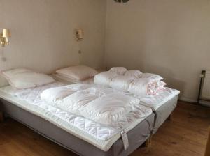 En eller flere senge i et værelse på Lundø