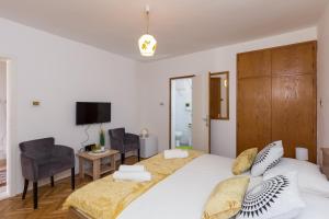 Posteľ alebo postele v izbe v ubytovaní Sunset Bay Room