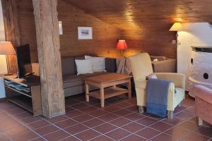 Ein Sitzbereich in der Unterkunft City Apartment Hornblick