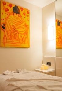Postel nebo postele na pokoji v ubytování Orbi City Hotel Official