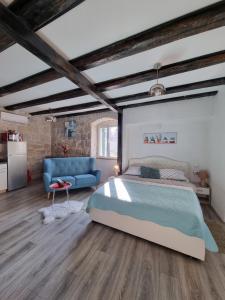 Ένα ή περισσότερα κρεβάτια σε δωμάτιο στο Heritage Apartments Trumbić