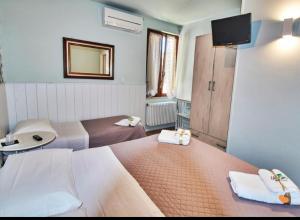 Posteľ alebo postele v izbe v ubytovaní Del Castello + 10 fotografií