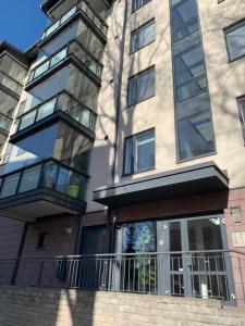 an apartment building with balconies on the side of it at Holiday Home Turku City in Turku