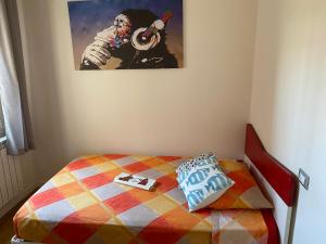 מיטה או מיטות בחדר ב-La Casa di Bea