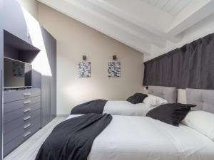 En eller flere senger på et rom på The Best Rent - Spacious apartment in Paolo Sarpi