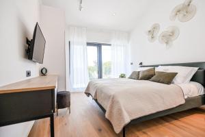 Łóżko lub łóżka w pokoju w obiekcie Luxury Villa Ante with pool