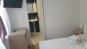 Postel nebo postele na pokoji v ubytování Casa Nicholas