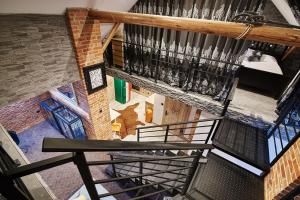 Postel nebo postele na pokoji v ubytování Apartament Dwupoziomowy Nad Tamami