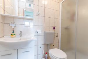 Koupelna v ubytování Apartments Mijatovic