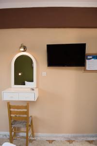 A television and/or entertainment centre at Southgate Apartments