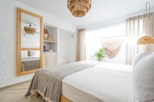 A bed or beds in a room at Voger Alaçatı Silence