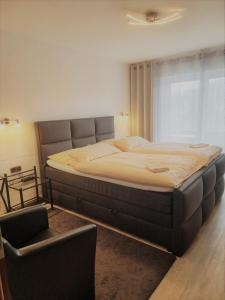 Postel nebo postele na pokoji v ubytování Hotel Kurhaus Uhlenberg