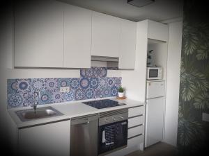 Kuchyňa alebo kuchynka v ubytovaní Appartement à 250m de la plage