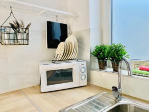 Telewizja i/lub zestaw kina domowego w obiekcie Mini Loft Plaza España