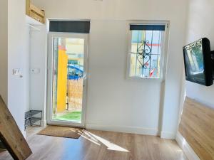 Telewizja i/lub zestaw kina domowego w obiekcie Mini Loft Plaza España