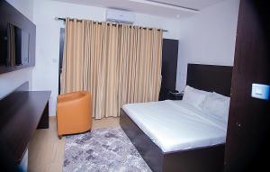 Katil atau katil-katil dalam bilik di Hotel Capitol