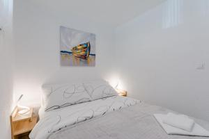 Posteľ alebo postele v izbe v ubytovaní Apartment Eli + 16 fotografií