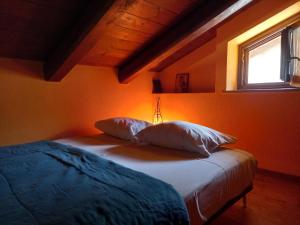 A bed or beds in a room at Natura e relax