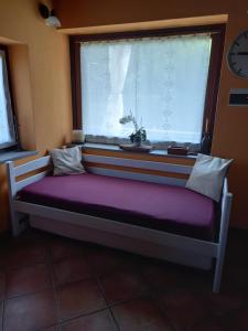 A bed or beds in a room at Natura e relax