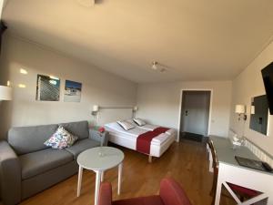 Postel nebo postele na pokoji v ubytování Nordby Hotell