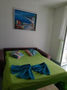 Een bed of bedden in een kamer bij La casa Verde