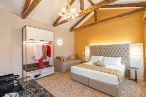 Posteľ alebo postele v izbe v ubytovaní Residenza La Duchessa Deluxe Rooms