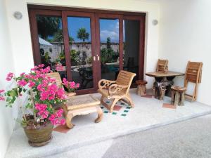 Posezení v ubytování Charming Apartment in Tambon Bo Put, 47 m², shared pool