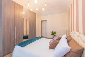 Posteľ alebo postele v izbe v ubytovaní Appartamento in Piazza Adriano in zona Cenisia